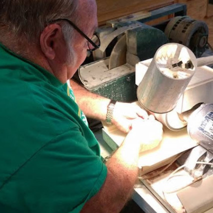 man working in lapidary shop